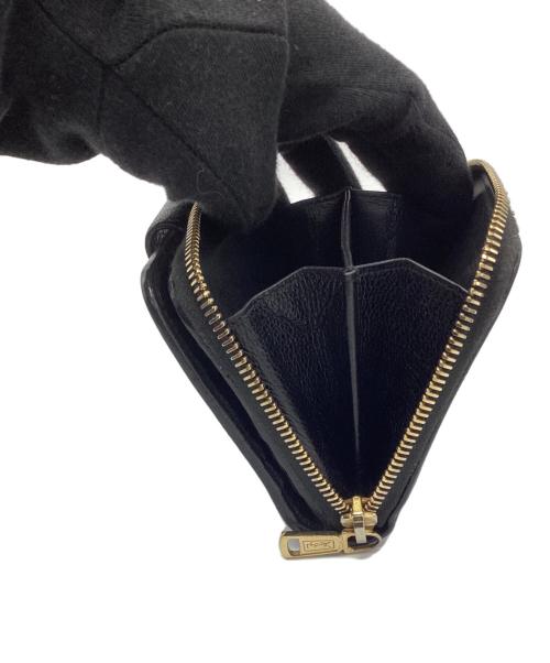 Yves Saint Laurent（イヴサンローラン）Yves Saint Laurent (イヴサンローラン) 2つ折り財布 ブラックの古着・服飾アイテム