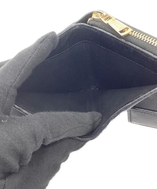 Yves Saint Laurent（イヴサンローラン）Yves Saint Laurent (イヴサンローラン) 2つ折り財布 ブラックの古着・服飾アイテム