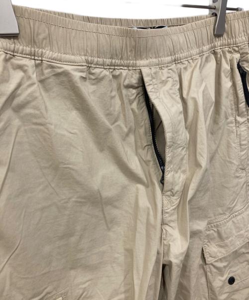 STONE ISLAND（ストーンアイランド）STONE ISLAND (ストーンアイランド) ガーメントダイストレッチカーゴパンツ ベージュ サイズ:32の古着・服飾アイテム