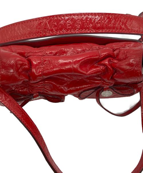 Acne studios（アクネ ストゥディオス）ACNE STUDIOS (アクネ ストゥディオス) マルチポケット マイクロバッグ レッドの古着・服飾アイテム