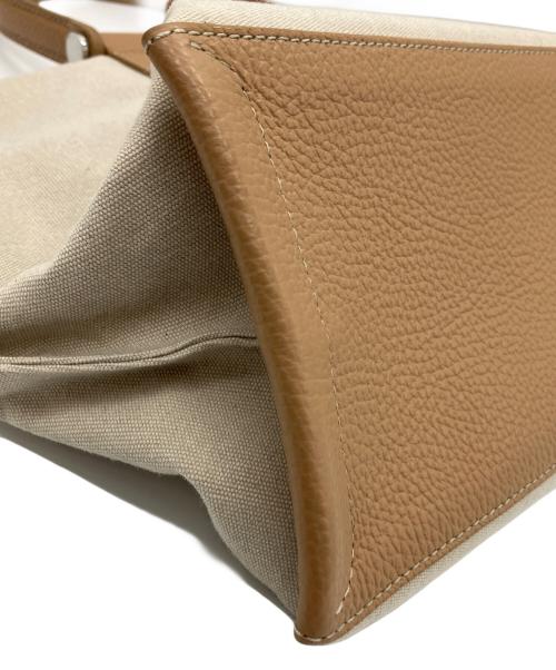 IACUCCI（イアクッチ）IACUCCI (イアクッチ) トートバッグ アイボリーの古着・服飾アイテム