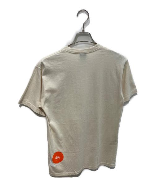stussy（ステューシー）stussy (ステューシー) 00ｓINTERNATIONAL TRIBE Tee アイボリー サイズ:Mの古着・服飾アイテム