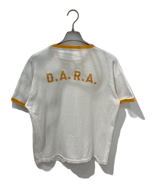 Champion（チャンピオン）Champion (チャンピオン) 染み込みプリント リンガーTシャツ　 60s プロダクツタグ ホワイト×イエロー サイズ:XLの古着・服飾アイテム