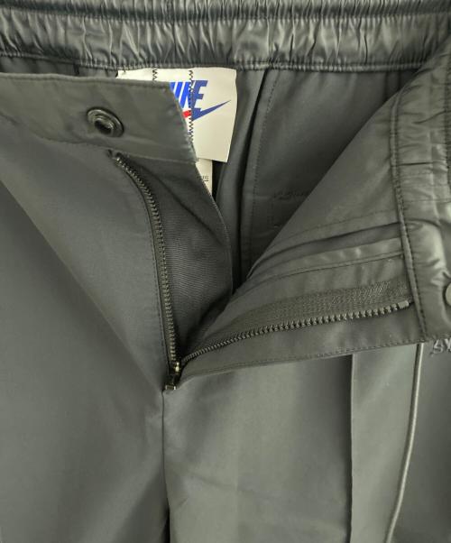 sacai（サカイ）sacai (サカイ) NIKE (ナイキ) ロゴ刺繍トラックパンツ ブラック サイズ:XXLの古着・服飾アイテム