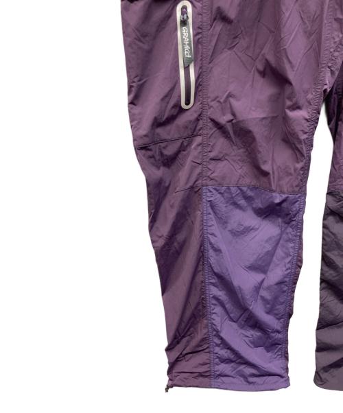 GRAMICCI（グラミチ）GRAMICCI (グラミチ) and wander (アンドワンダー) PATCHWORK WIND PANT パープル サイズ:2XL 未使用品の古着・服飾アイテム