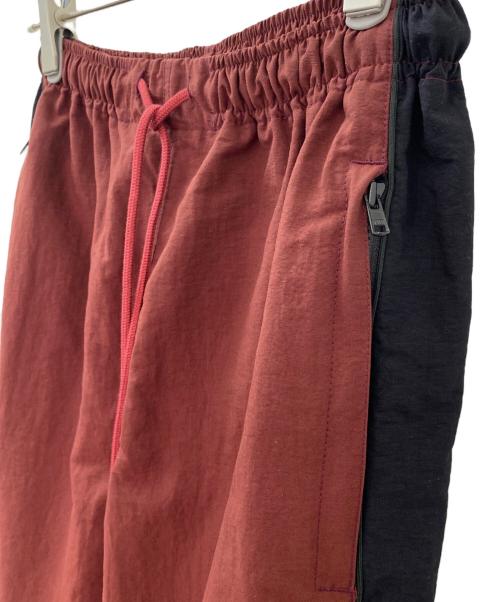 m.u Japoness（エムユー）m.u Japoness (エムユー) bicolor nylon pants BUR ボルドー サイズ:FREEの古着・服飾アイテム