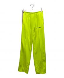 Palm Angels（パーム エンジェルス）の古着「トラックパンツ」｜イエロー