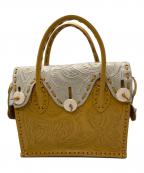 Carving Tribesカービングトライブス）の古着「BI MaestraS」｜アイボリー×マスタード