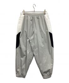 NIKE（ナイキ）の古着「オーバーサイズド ウーブン トラックパンツ」｜グレー