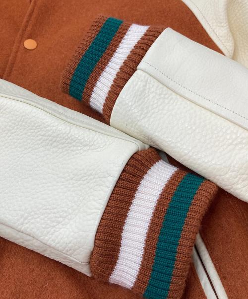 SEVESKIG（セヴシグ）SEVESKIG (セヴシグ) COLOR STUDIUM JUMPER 袖レザースタジャン　ラグランジャケット ブラウン サイズ:Mの古着・服飾アイテム