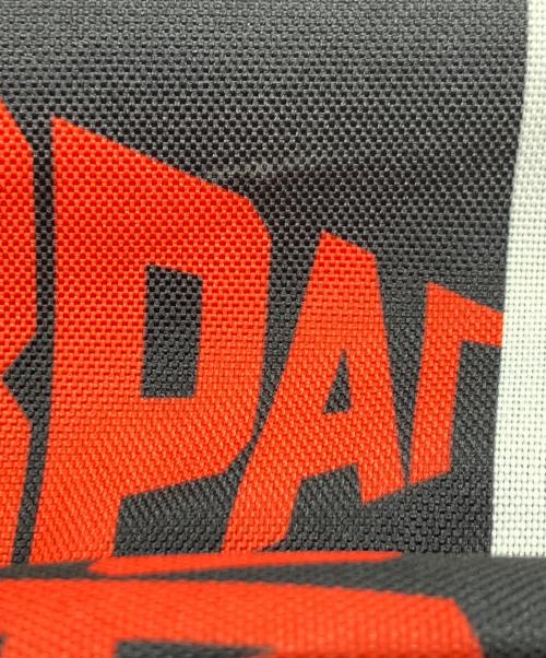 Gosha Rubchinskiy（ゴーシャラブチンスキー）Gosha Rubchinskiy (ゴーシャラブチンスキー) 総柄リュック レッドの古着・服飾アイテム