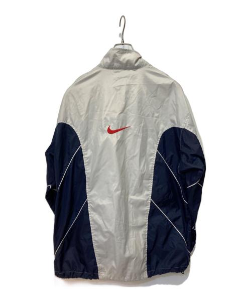 NIKE（ナイキ）NIKE (ナイキ) ナイロンジャケット グレー×ネイビー サイズ:Ｌの古着・服飾アイテム