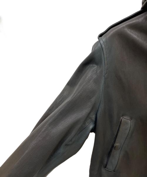 ISAMU KATAYAMA BACKLASH（イサムカタヤマ・バックラッシュ）ISAMU KATAYAMA BACKLASH (イサムカタヤマ・バックラッシュ) ゴードレザー タンニン製品染め モッズコート ブラック サイズ:Mの古着・服飾アイテム