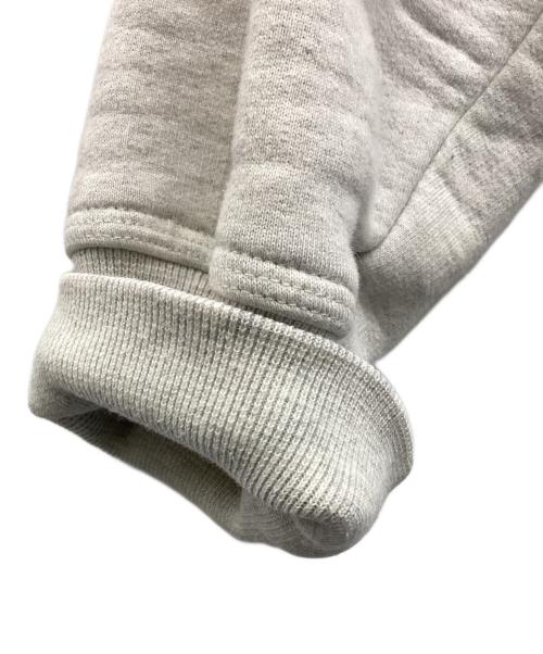 stussy（ステューシー）stussy (ステューシー) WORLD TOUR HOODIE ライトグレー サイズ:Sの古着・服飾アイテム