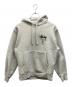 stussy（ステューシー）の古着「WORLD TOUR HOODIE」｜ライトグレー