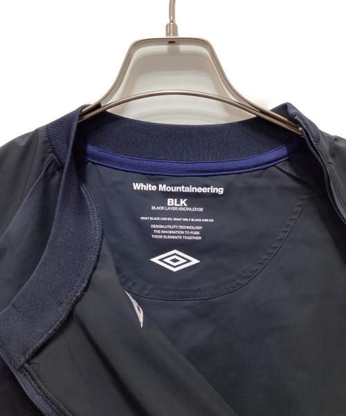 WHITE MOUNTAINEERING（ホワイトマウンテ二アニング）WHITE MOUNTAINEERING (ホワイトマウンテ二アニング) UMBRO (アンブロ) プルオーバージャケット ブラック サイズ:Lの古着・服飾アイテム