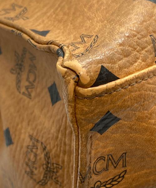 MCM（エムシーエム）MCM (エムシーエム) ロゴグラムレザートートバッグ ブラウンの古着・服飾アイテム