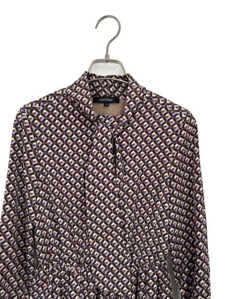 UNTITLED（アンタイトル）UNTITLED (アンタイトル) ビンテージ風ジオメ柄 ボウタイワンピース ブラックの古着・服飾アイテム