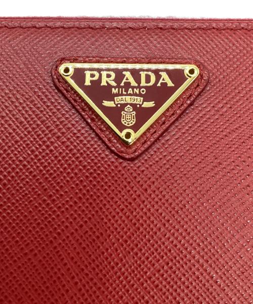 PRADA（プラダ）PRADA (プラダ) ラウンドファスナー長財布 レッドの古着・服飾アイテム