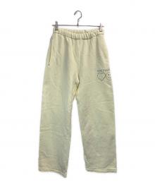 madhappy（マッドハッピー）の古着「スウェットパンツ」｜イエロー
