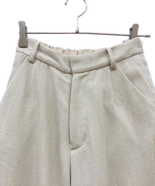 NOUNLESS（ナウンレス）NOUNLESS (ナウンレス) ルーズ ラウンド スリットパンツ ミルク サイズ:1の古着・服飾アイテム