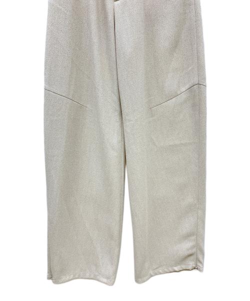 NOUNLESS（ナウンレス）NOUNLESS (ナウンレス) ルーズ ラウンド スリットパンツ ミルク サイズ:1の古着・服飾アイテム