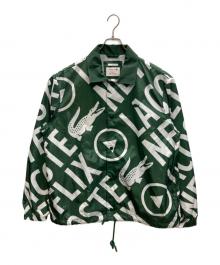 LACOSTE×NETFLIX（ラコステ×ネットフリックス）の古着「総柄コーチジャケット」｜グリーン