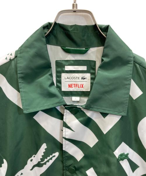 LACOSTE（ラコステ）LACOSTE (ラコステ) NETFLIX (ネットフリックス) 総柄コーチジャケット グリーン サイズ:SIZE Lの古着・服飾アイテム