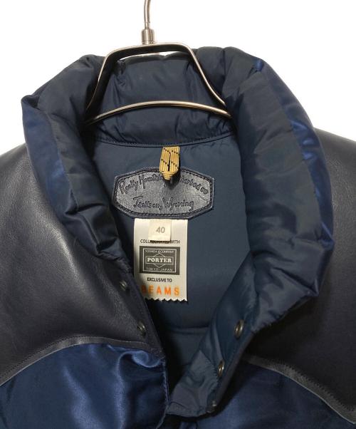 RockyMountainFeatherBed（ロッキーマウンテンフェザーベッド）RockyMountainFeatherBed (ロッキーマウンテンフェザーベッド) PORTER (ポーター) BEAMS (ビームス) ヨークレザーダウンベスト ネイビー サイズ:40の古着・服飾アイテム