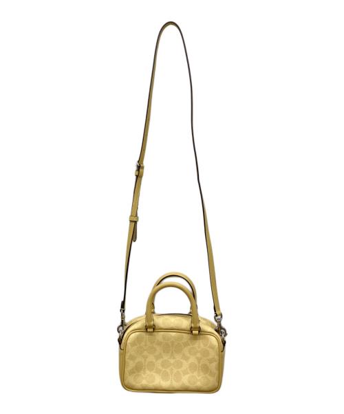 COACH（コーチ）COACH (コーチ) PEANUTS (ピーナッツ) サッチェル クロスボディ バッグ イエローの古着・服飾アイテム