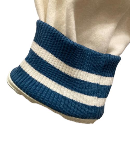 13DE MARZO（トレセ デ マルソ）13DE MARZO (トレセ デ マルソ) SMILEY (スマイリー) コラボスタジャン アイボリー×ブルー サイズ:Ⅼの古着・服飾アイテム