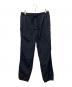 UNUSED（アンユーズド）の古着「NYLON EASY PANTS」｜ネイビー