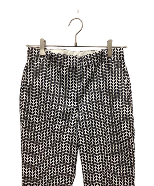 tory sport（トリースポーツ）tory sport (トリースポーツ) 総柄パンツ ネイビーの古着・服飾アイテム