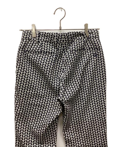 tory sport（トリースポーツ）tory sport (トリースポーツ) 総柄パンツ ネイビーの古着・服飾アイテム