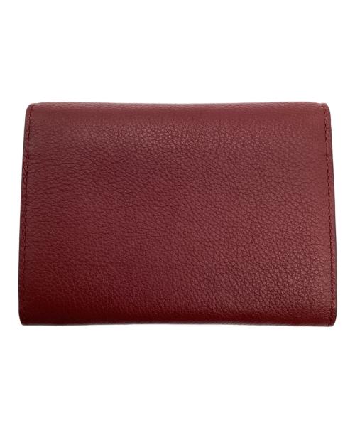 Cartier（カルティエ）Cartier (カルティエ) コンパクトウォレット レッドの古着・服飾アイテム