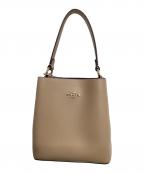 COACHコーチ）の古着「スモール タウン バケット バッグ」｜ベージュ