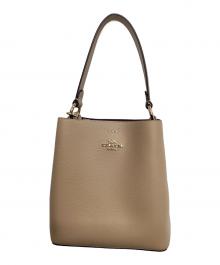 COACH（コーチ）の古着「スモール タウン バケット バッグ」｜ベージュ