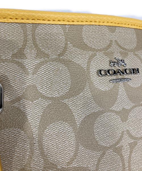 COACH（コーチ）COACH (コーチ) シグネチャートートバッグ イエローの古着・服飾アイテム