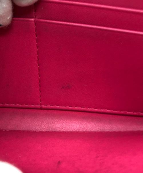 Dior（ディオール）DIOR (ディオール) チャーム付長財布 ショッキングピンクの古着・服飾アイテム