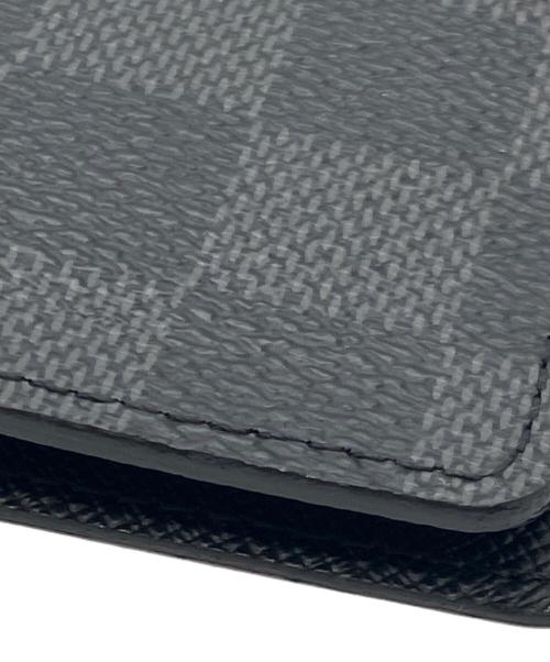 LOUIS VUITTON（ルイ ヴィトン）LOUIS VUITTON (ルイ ヴィトン) パスポートケース　ダミエ・グラフィット　クーヴェルテュール・パスポール ブラックの古着・服飾アイテム