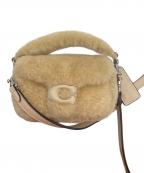 COACHコーチ）の古着「タビー 12・シアリング」｜ベージュ