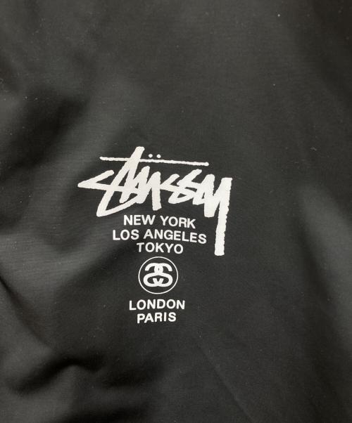 stussy（ステューシー）stussy (ステューシー) Champion (チャンピオン) ワールドツアーコーチジャケット ブラック サイズ:ＸＬの古着・服飾アイテム