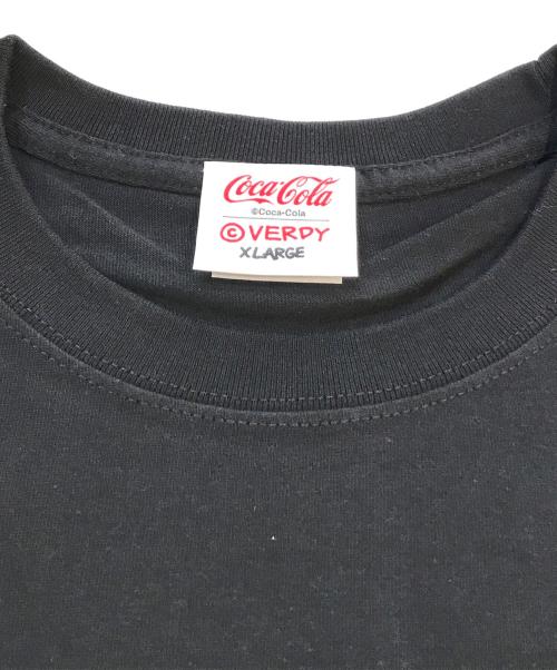 VERDY（ヴェルディ）VERDY (ヴェルディ) Coca Cola (コカコーラ) Tシャツ　Coca-Cola X Fes 2025限定品 ブラック サイズ:XL 未使用品の古着・服飾アイテム