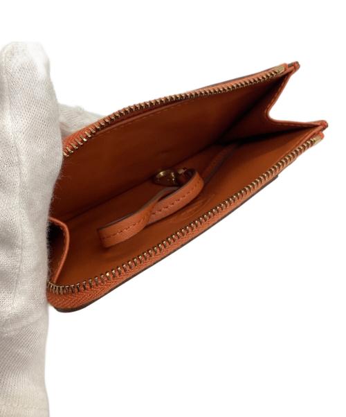 TOD'S（トッズ）TOD'S (トッズ) フラグメントケース オレンジの古着・服飾アイテム