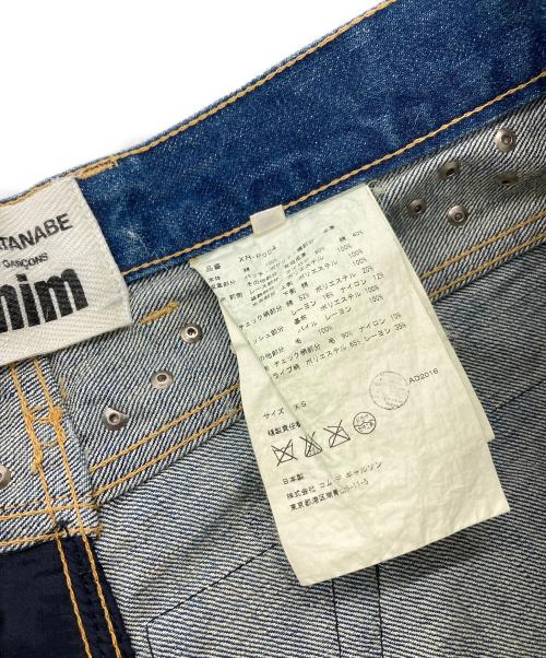 JUNYA WATANABE COMME des GARCONS（(ジュンヤワタナベ コムデギャルソン）JUNYA WATANABE COMME des GARCONS ((ジュンヤワタナベ コムデギャルソン) ランダムパッチワークデニムパンツ　デザインパンツ　デニムパンツ　日本製 インディゴ サイズ:XSの古着・服飾アイテム