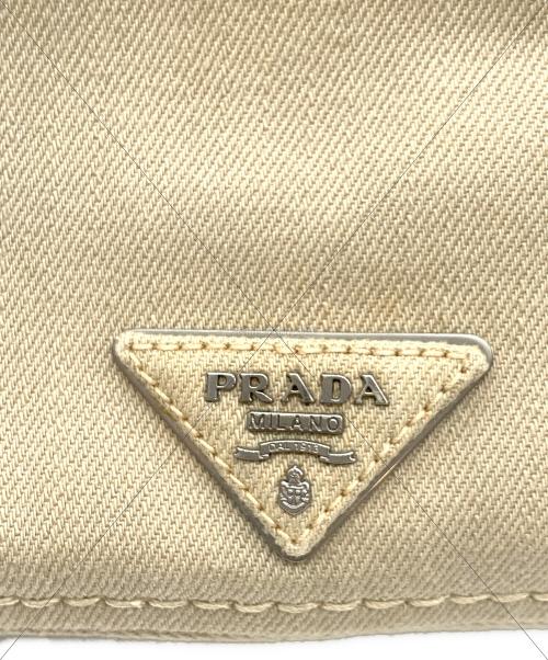PRADA（プラダ）PRADA (プラダ) フリンジデニムチェーンショルダーバッグ ベージュの古着・服飾アイテム