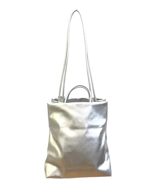 LAYAS（レイヤーズ）LAYAS (レイヤーズ) RADIATE (ラディエイト) PAINT LOGO TOTE BAG シルバー 未使用品の古着・服飾アイテム