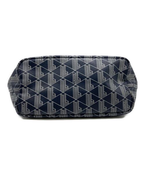 LACOSTE（ラコステ）LACOSTE (ラコステ) ゼリィ コーテッドキャンバスモノグラムスモールトート ネイビーの古着・服飾アイテム