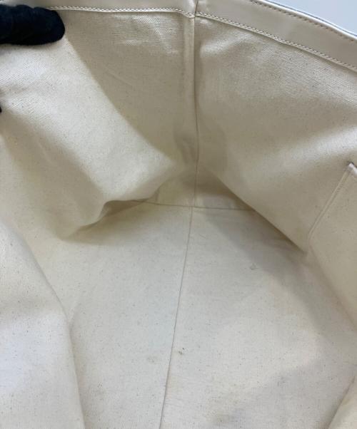 NOTHING WRITTEN（ナッシングリトゥン）NOTHING WRITTEN (ナッシングリトゥン) ラージトートバッグ アイボリーの古着・服飾アイテム