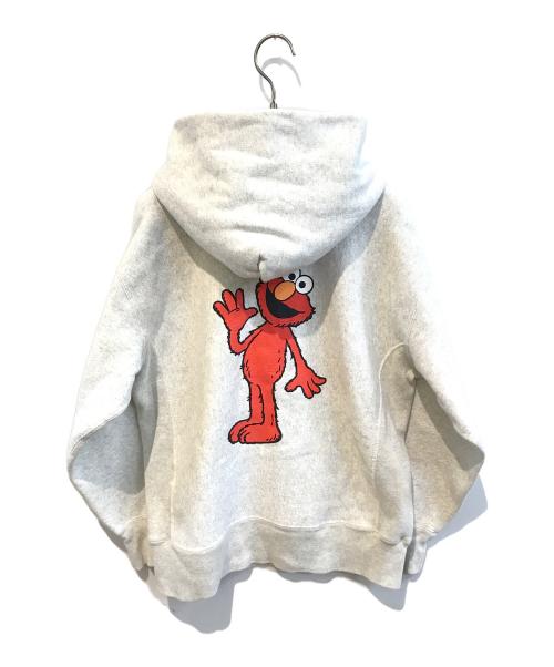 Champion REVERSE WEAVE（チャンピオン リバース ウィーブ）Champion REVERSE WEAVE (チャンピオン リバース ウィーブ) SESAME STREET (セサミストリート) ELMOパーカー ライトグレー サイズ:Lの古着・服飾アイテム